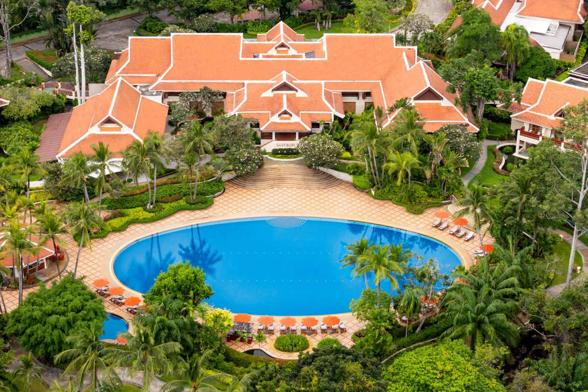 Aerial view of Santiburi Koh Samui resort and swimming pool surrounded by tropical gardens