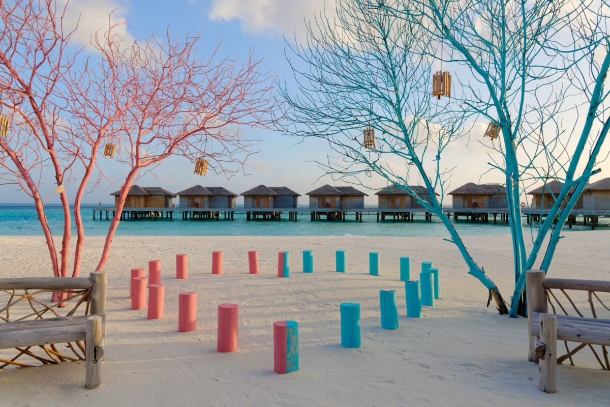 You & Me Cocoon Maldives resort with overwater villas and tropical surroundings