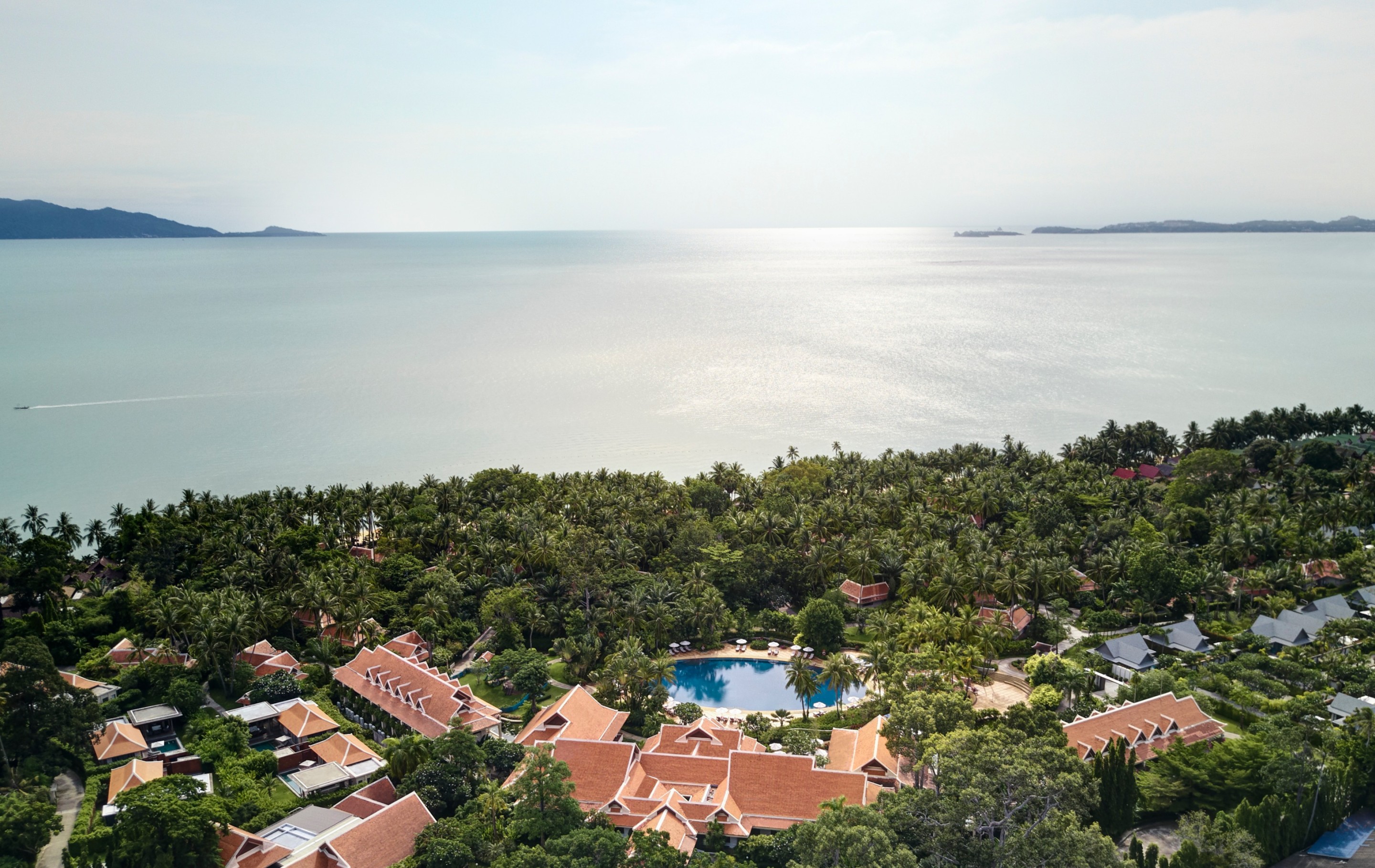 Aerial view of Santiburi Koh Samui and tropical coastline on Koh Samui