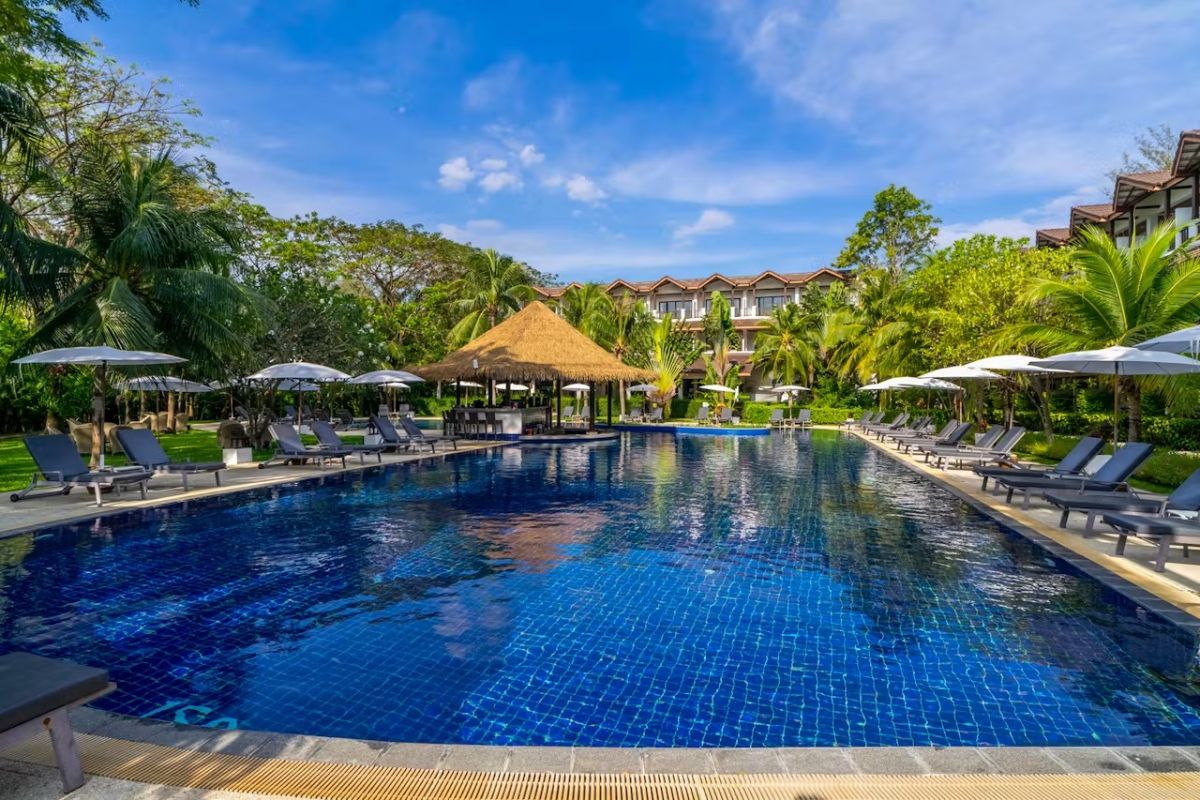 Poolside relaxation at Sunprime Kamala Beach Resort Phuket