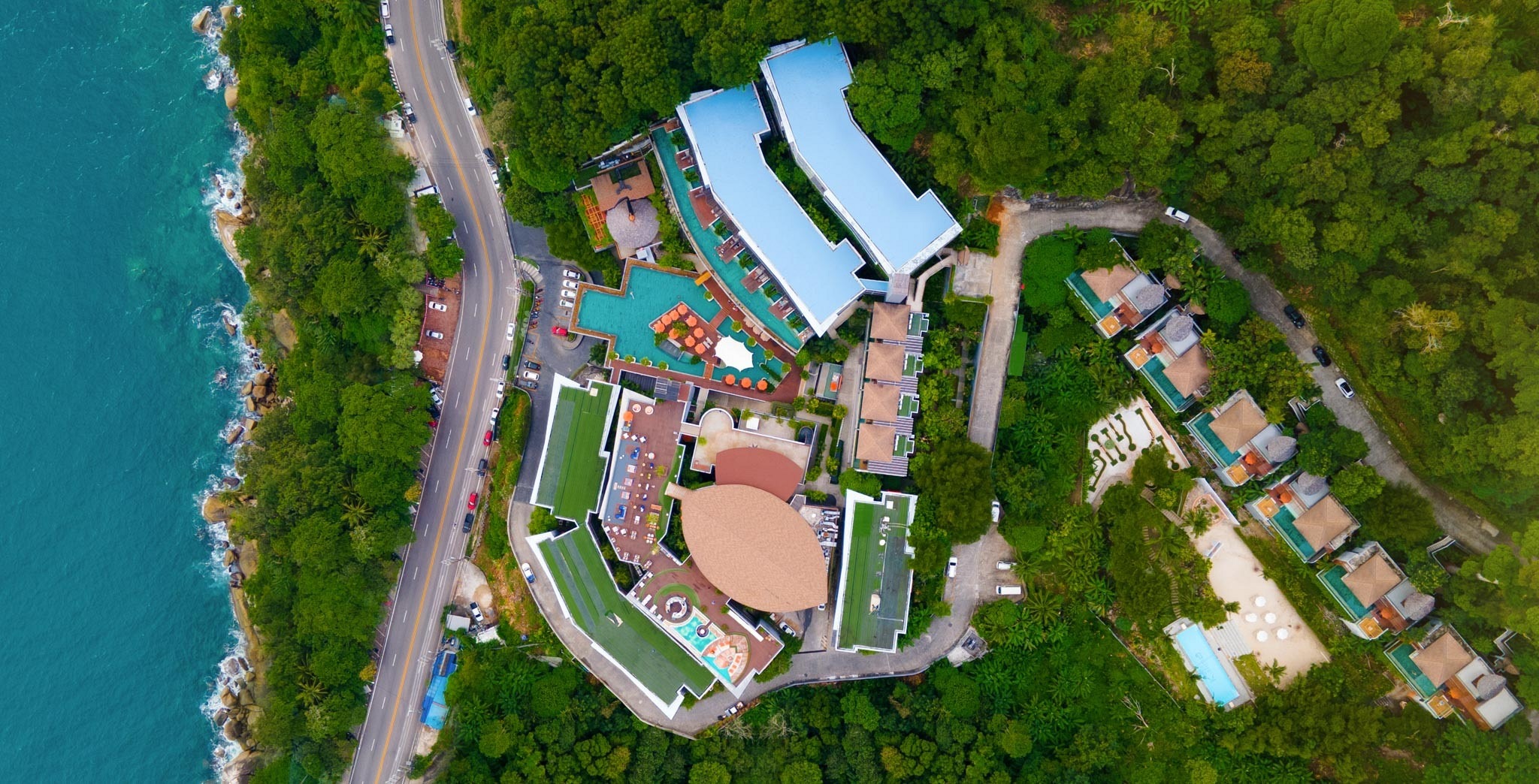 Aerial view of Kalima Resort & Spa Phuket and its hillside facilities