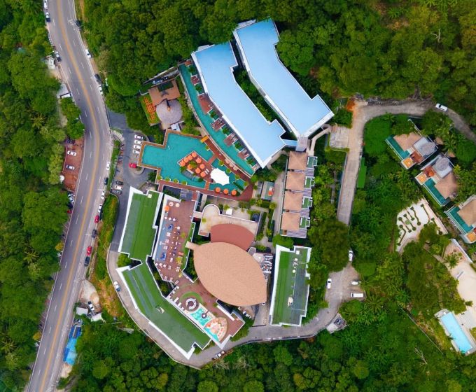 Aerial view of Kalima Resort & Spa Phuket and its hillside facilities