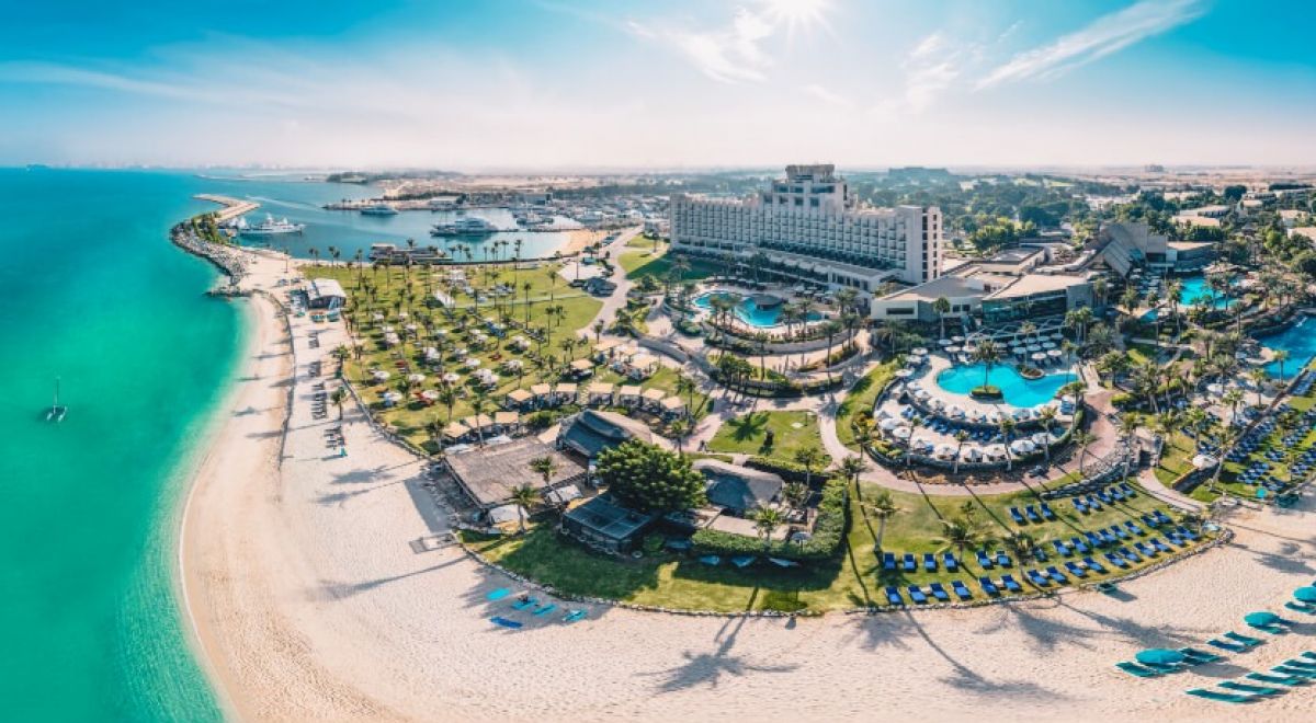 JA Beach Hotel Dubai aerial view with private beach and resort