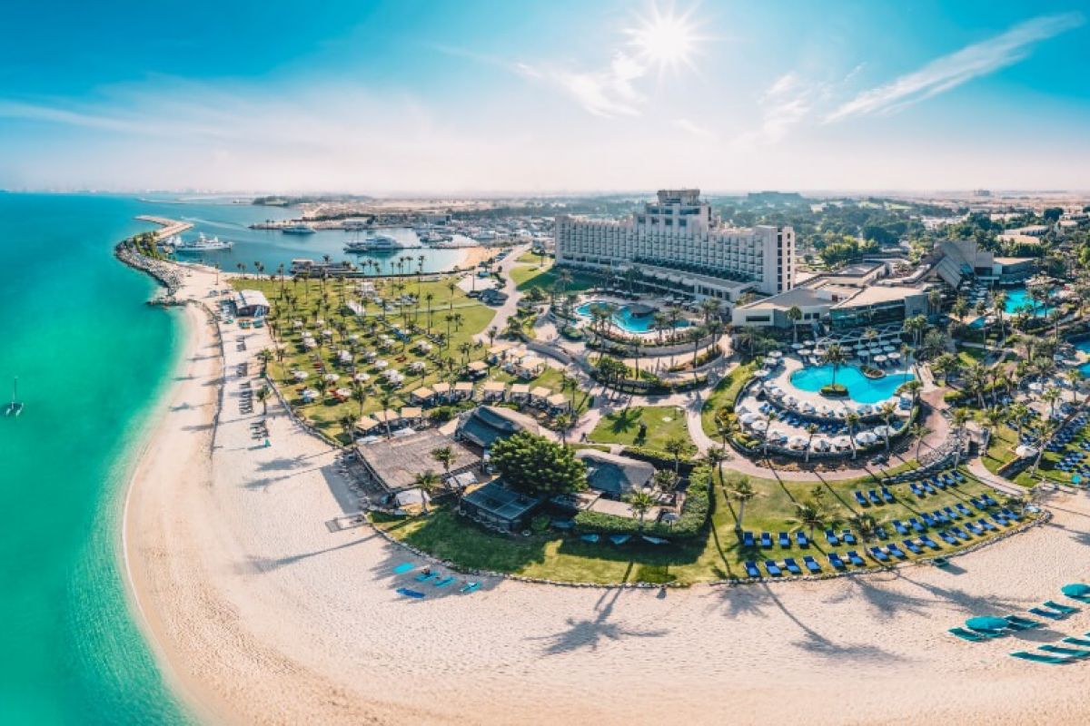 JA Beach Hotel Dubai aerial view with private beach and resort