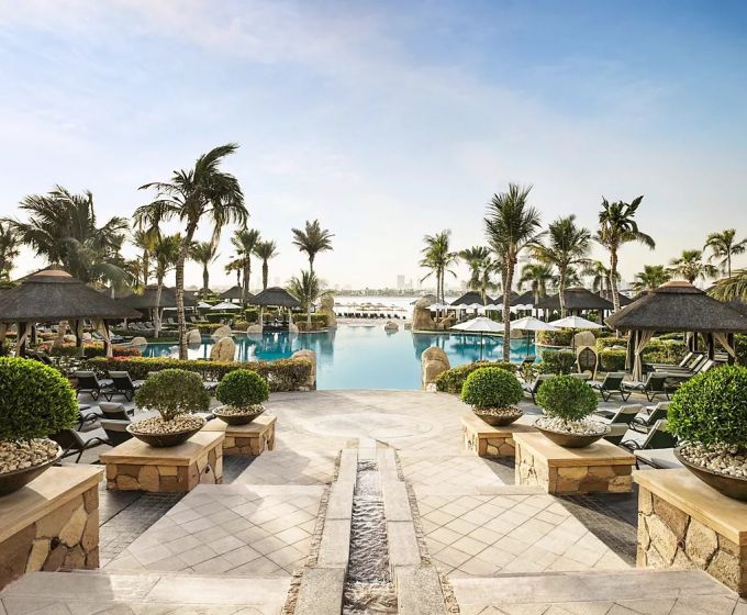 Luxury pool and landscaped grounds at Sofitel Dubai The Palm