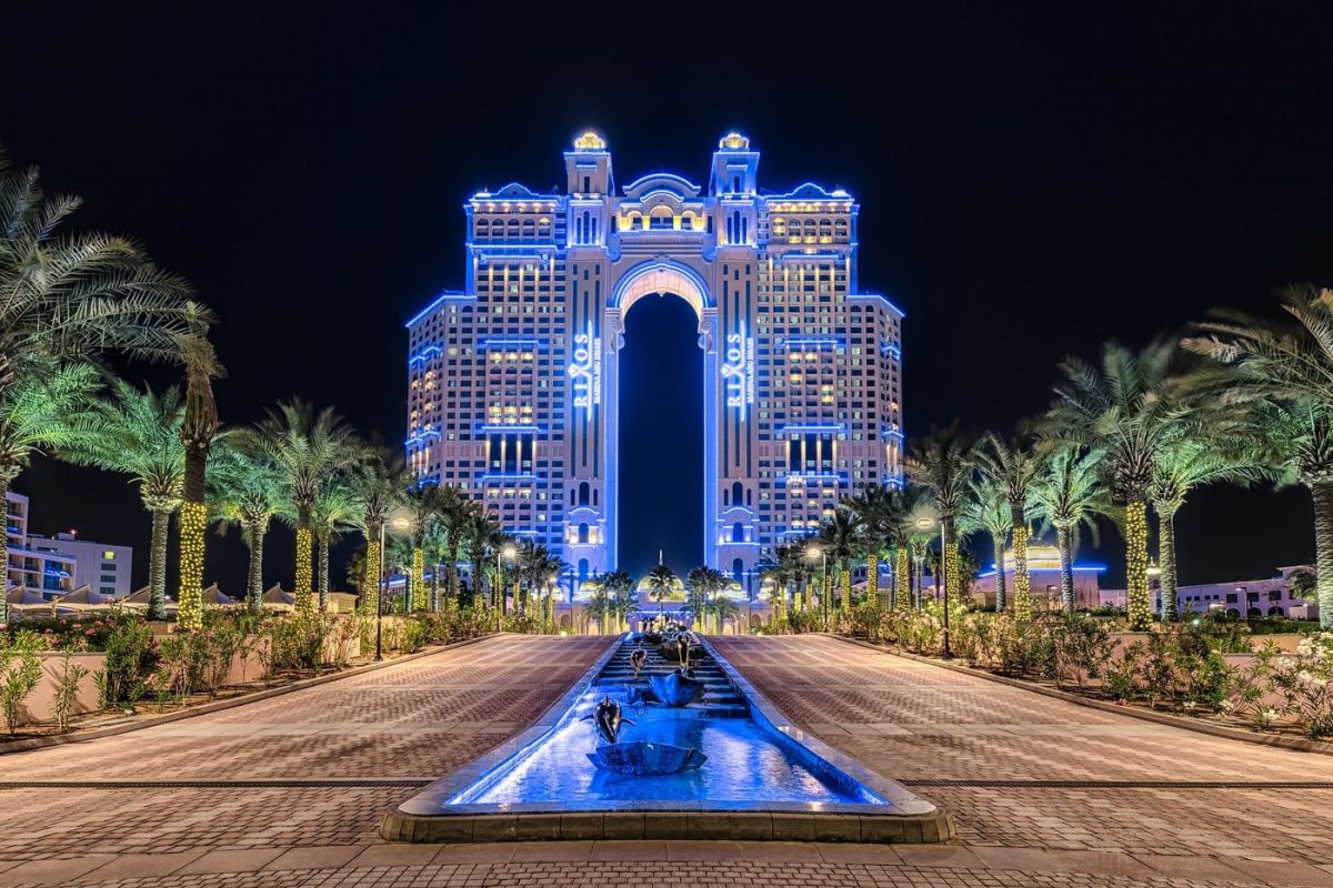 Rixos Marina Abu Dhabi illuminated at night
