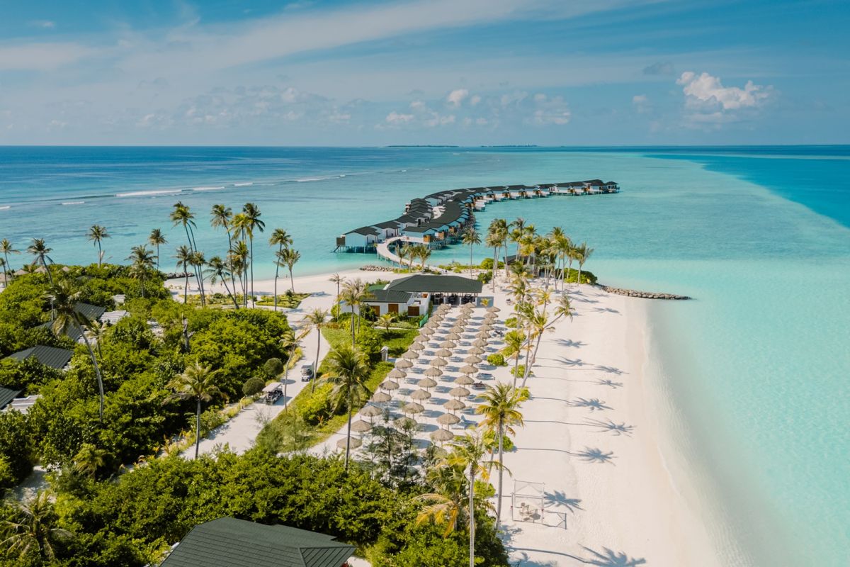 Joy Island Maldives aerial view with white sandy beach and turquoise lagoon