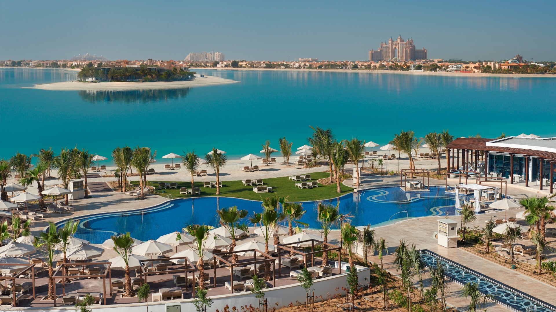 Waldorf Astoria Dubai Palm Jumeirah private beach and pool overlooking Palm Jumeirah
