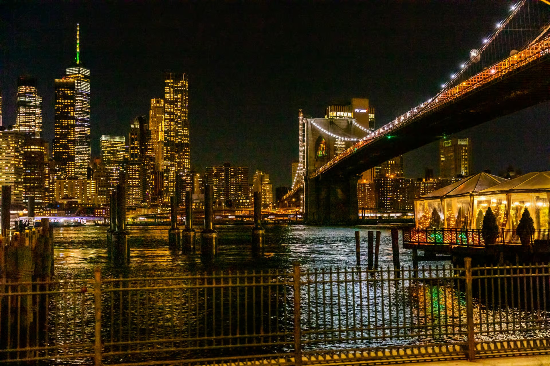 New York City skyline and Brooklyn Bridge at night