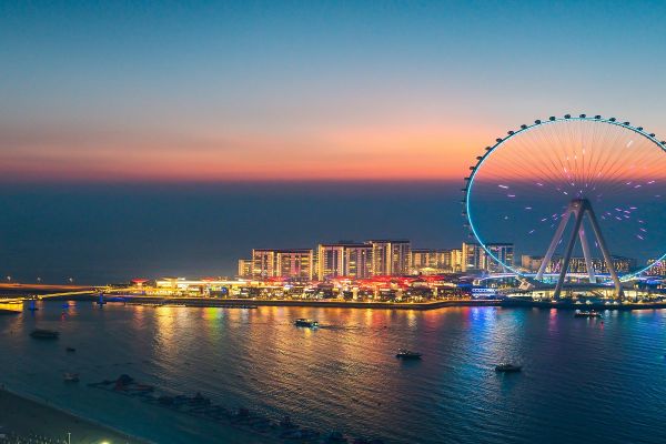 Ain Dubai observation wheel and Bluewaters Island skyline at sunset