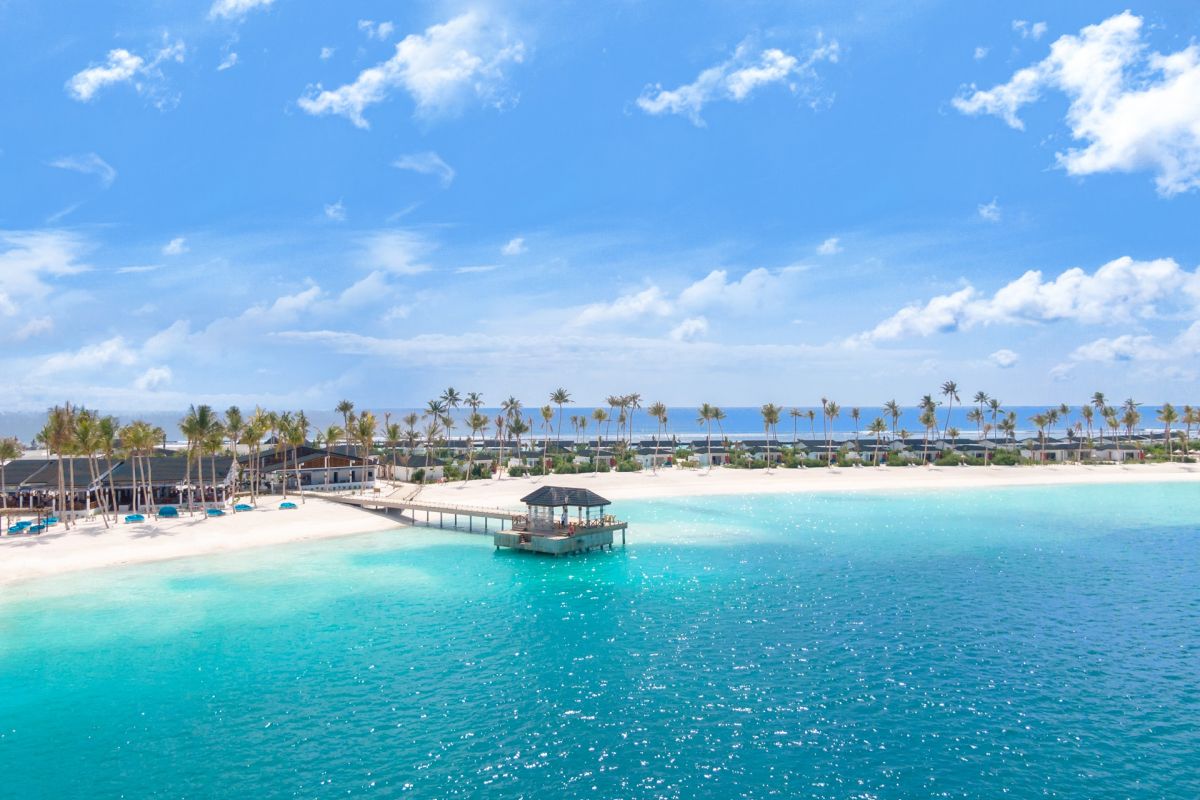 Joy Island Maldives arrival jetty and turquoise lagoon