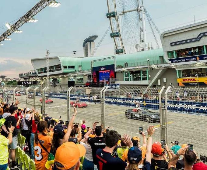 Spectators watching the Singapore Grand Prix race from the circuit