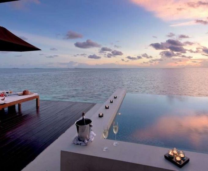 Lily Beach Resort and Spa Maldives Luxury Water Villa at Sunset