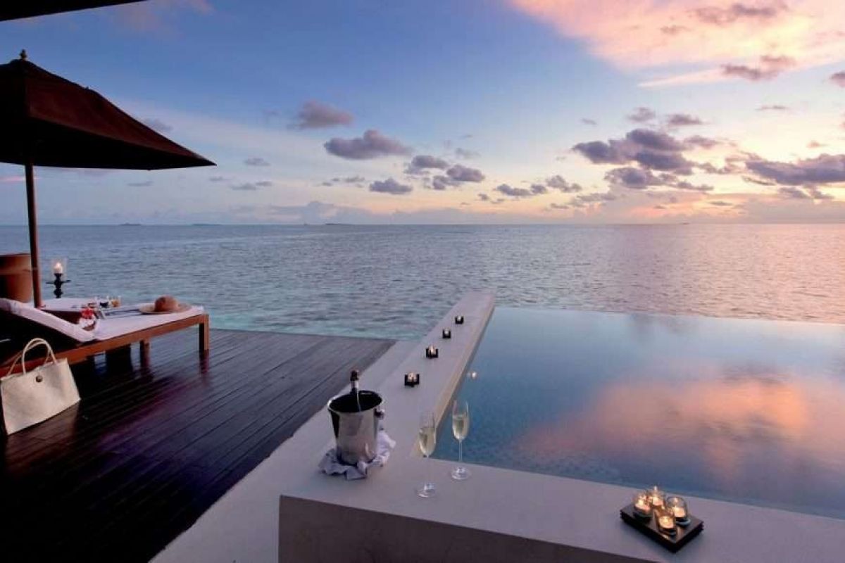 Lily Beach Resort and Spa Maldives Luxury Water Villa at Sunset