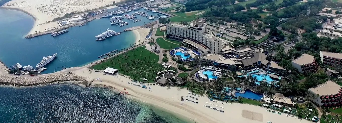JA The Resort Dubai aerial view with beach and swimming pools