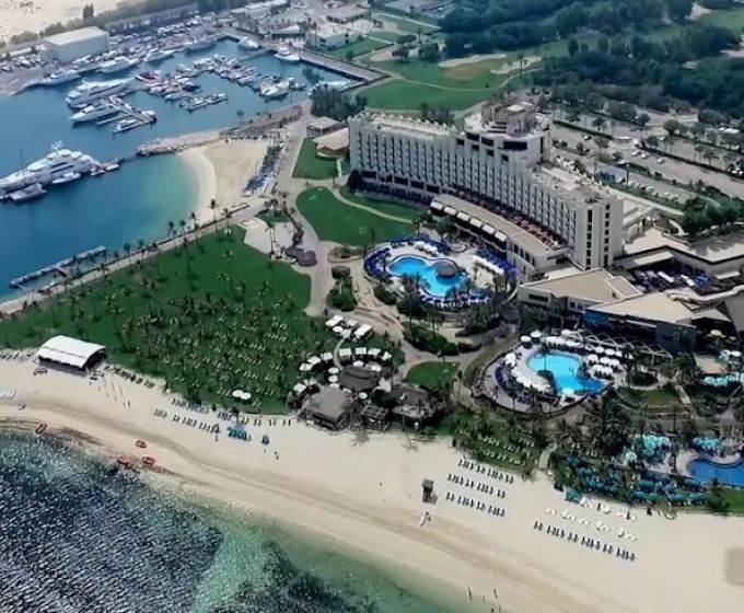 JA The Resort Dubai aerial view with beach and swimming pools